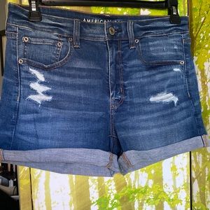 AMERICAN EAGLE size 12 super stretch midi distressed light blue jean shorts